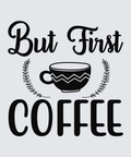 A typographic design reading 'But First COFFEE' in black lettering on a light gray background, with a black coffee cup and leafy decorative flourishes in the center.
